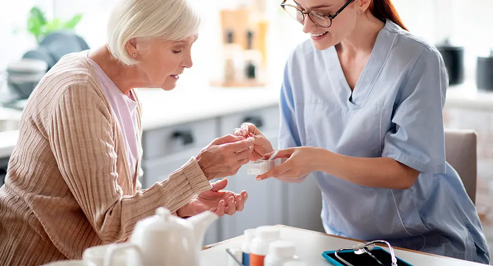 Équipe de soins au chevet d’un patient